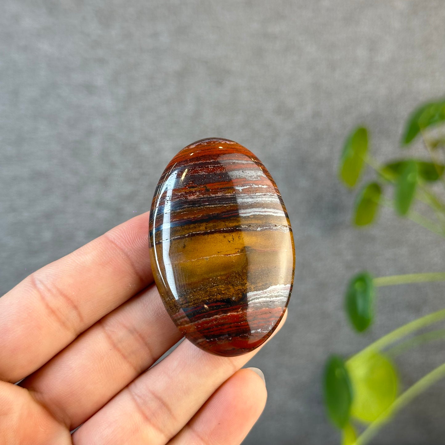 Red Titan Natural Tiger Eye Palm Stone