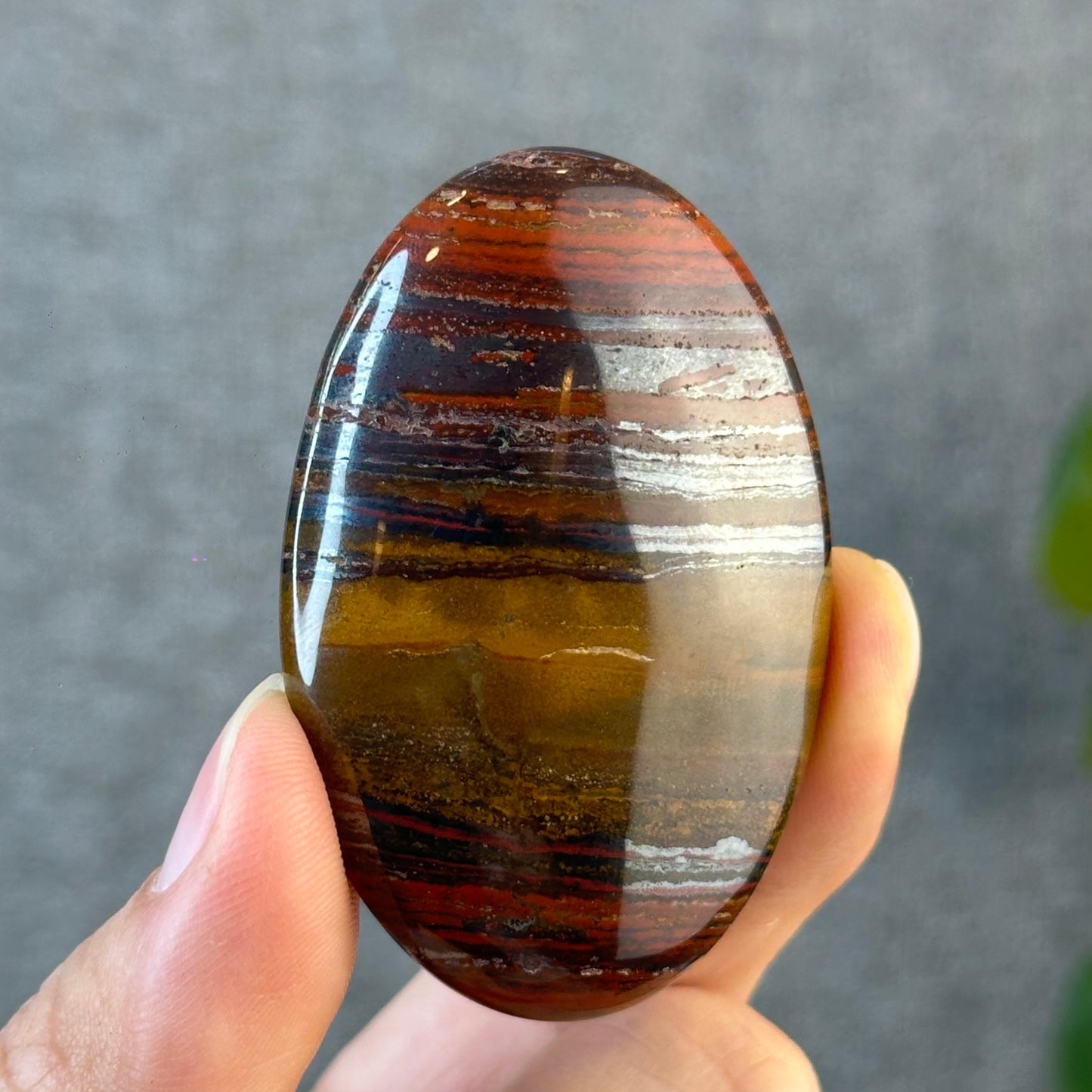 Red Titan Natural Tiger Eye Palm Stone