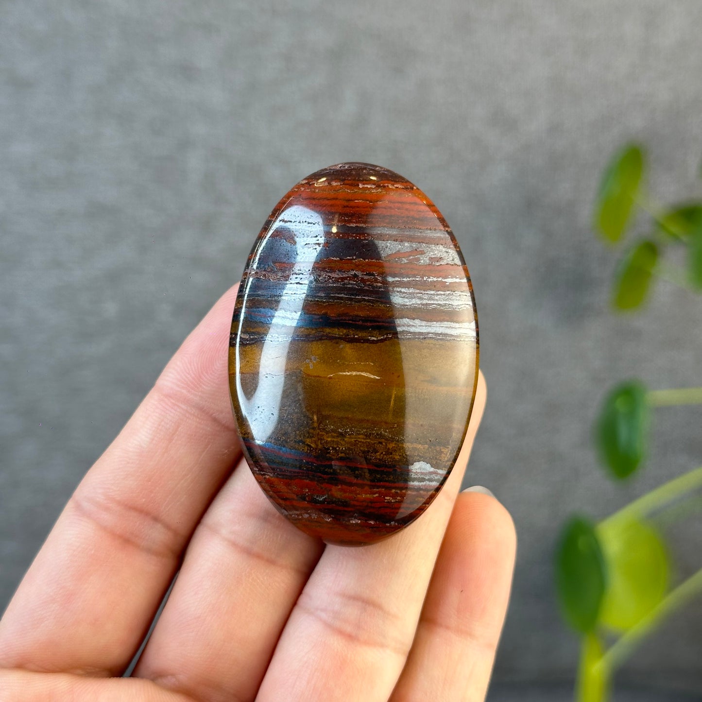 Red Titan Natural Tiger Eye Palm Stone