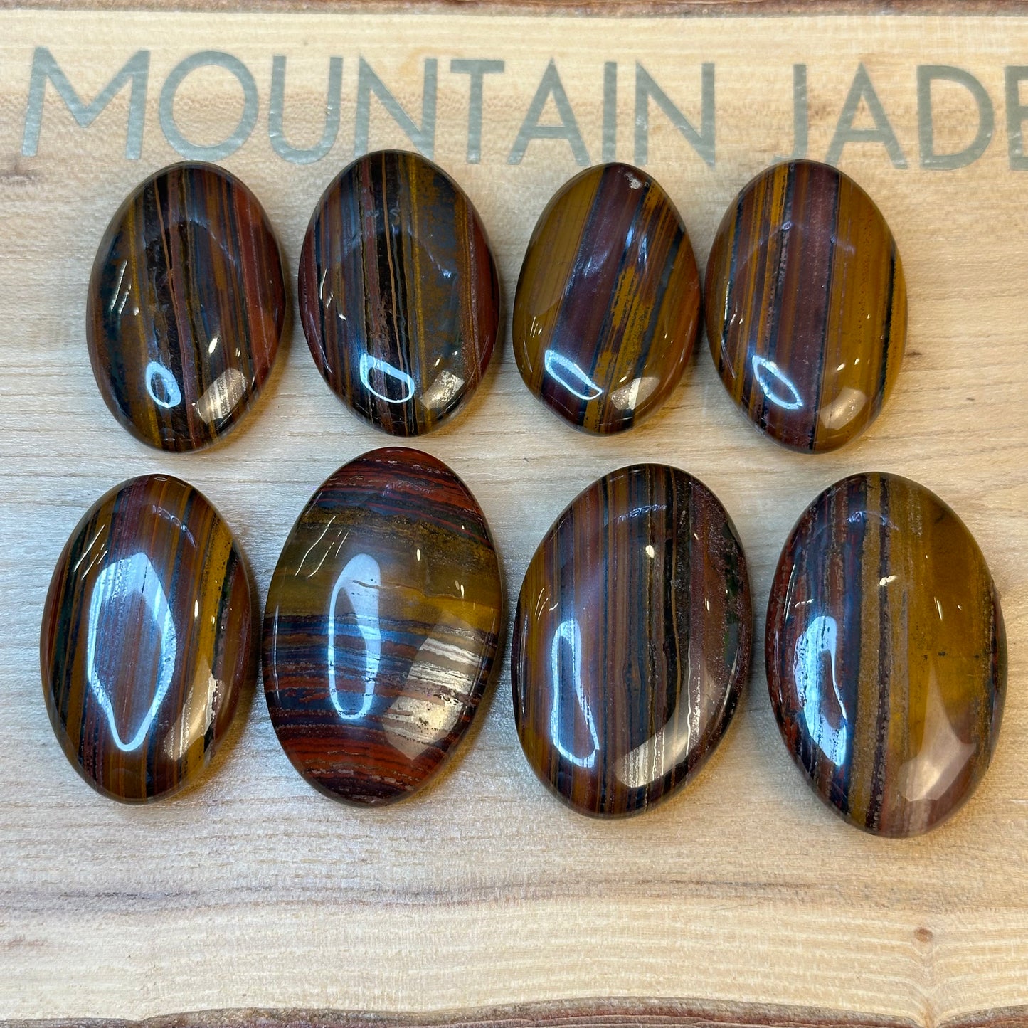 Red Titan Natural Tiger Eye Palm Stone