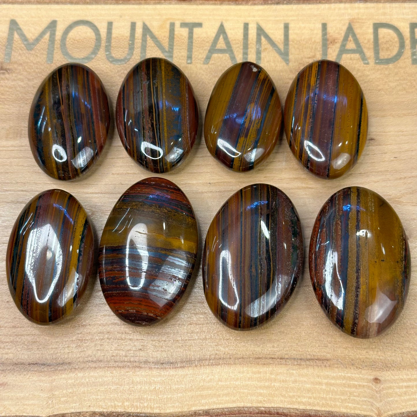 Red Titan Natural Tiger Eye Palm Stone