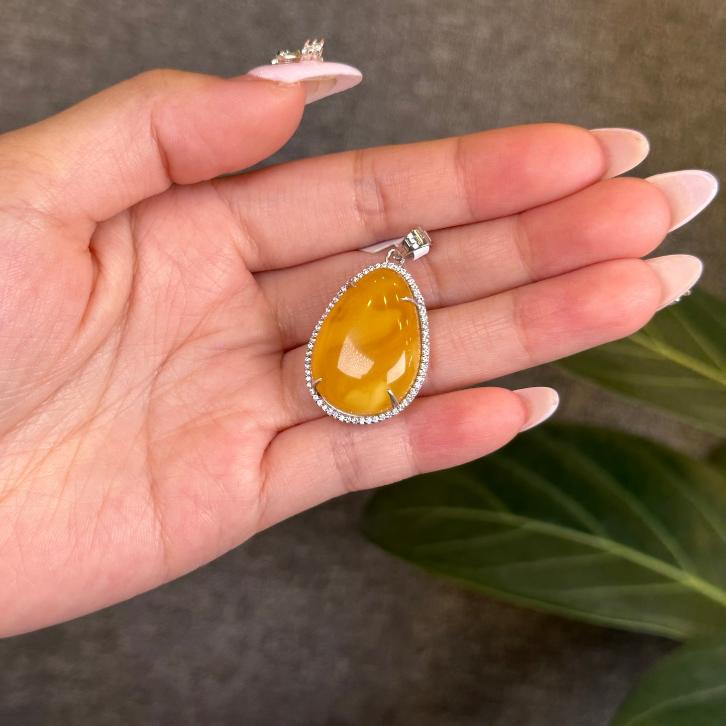 Water Drop Amber Pendant in Silver Setting