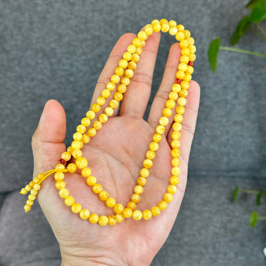 Bracelet triple tour en ambre doré 108 perles taille 6 mm