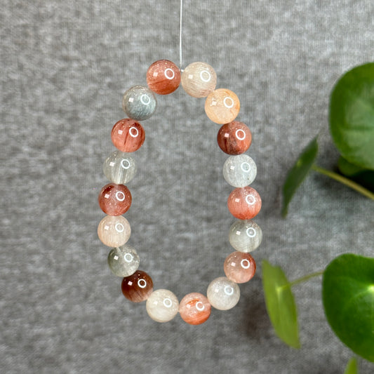 Poils de lapin arc-en-ciel Amphibole Quartz Taille 11,5 mm