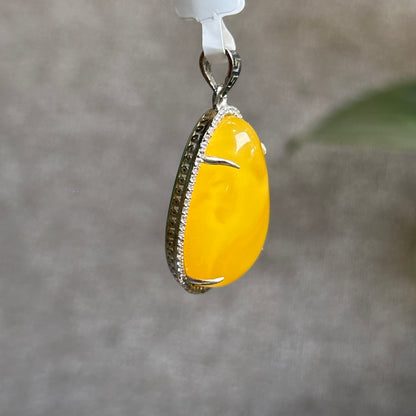 Water Drop Amber Pendant in Silver Setting