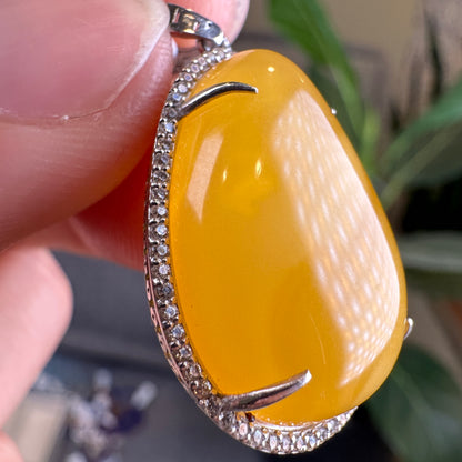 Water Drop Amber Pendant in Silver Setting