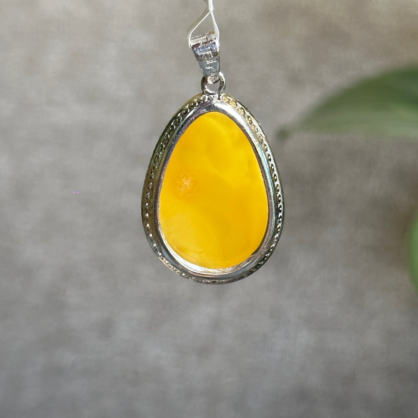 Water Drop Amber Pendant in Silver Setting