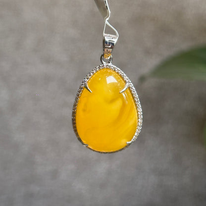 Water Drop Amber Pendant in Silver Setting