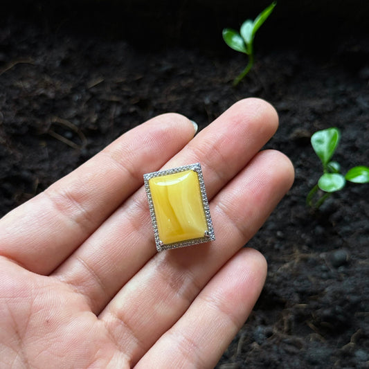 Rectangular Golden Amber Charm in Silver with White Stone Setting