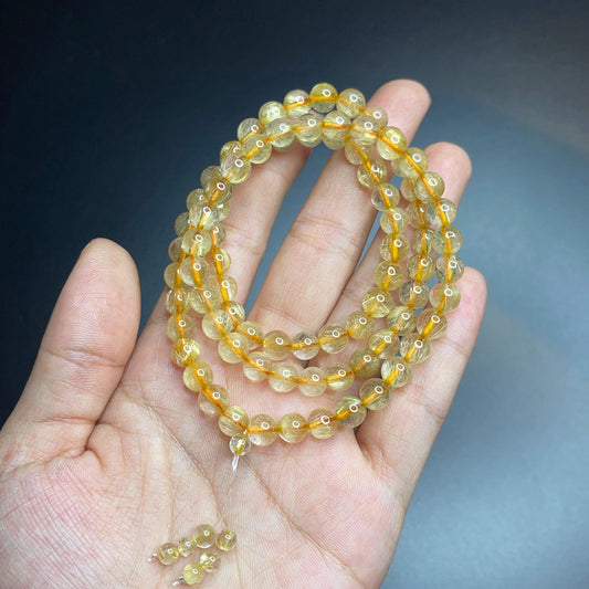 Bracelet triple tour en quartz rutilé doré taille 6,5 mm